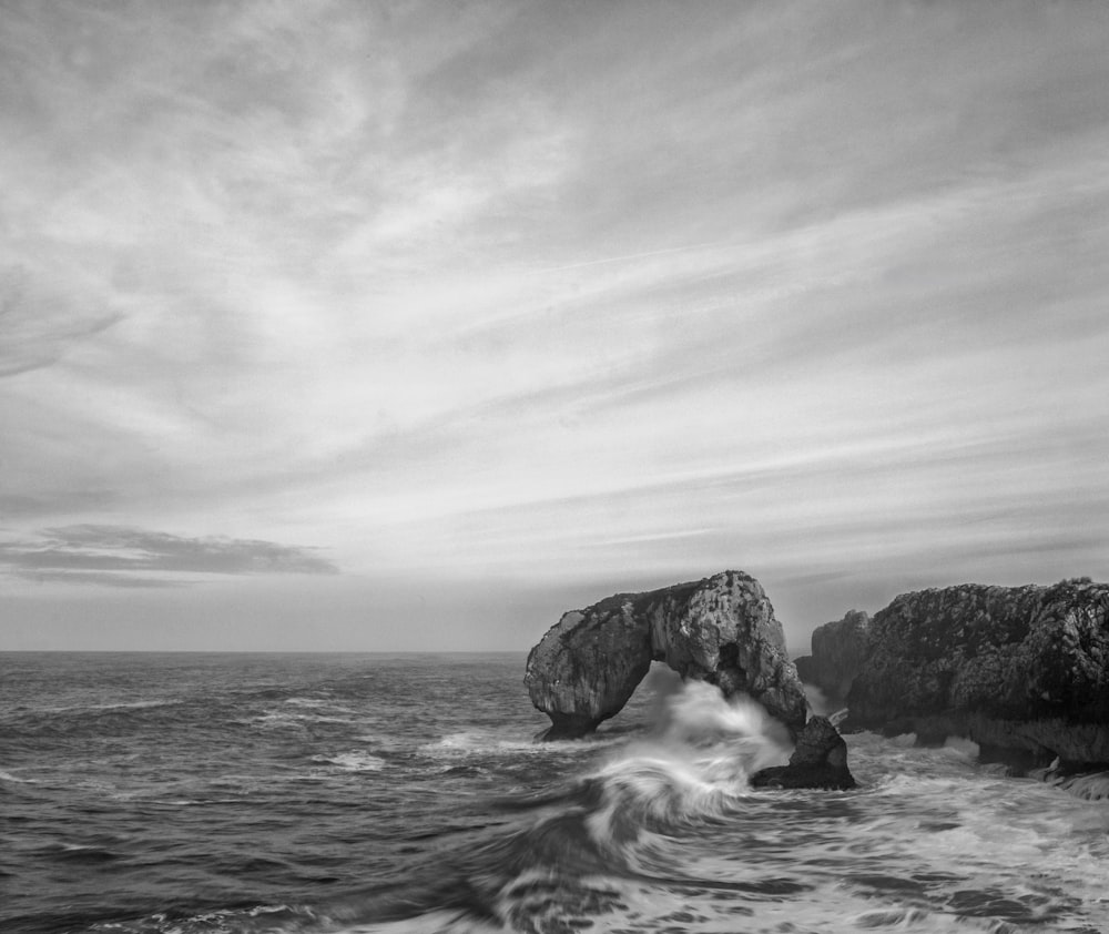 grayscale photo of body of water