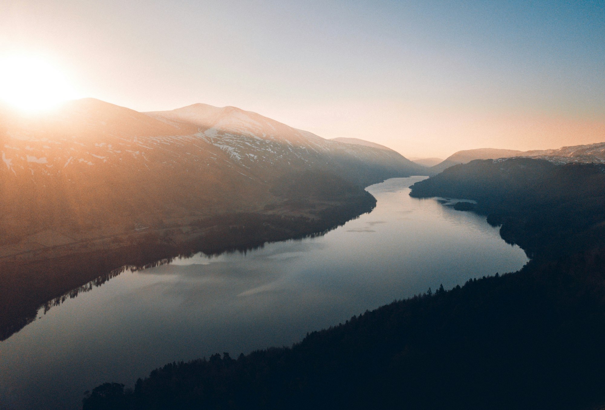 Setting off just before dawn, we hiked the short 1km trail up to the top of Raven Crag, which overlooks the length of Thirlmere. It was one of those bitingly cold winter mornings, but the moment the sun came up over the Helvellyn range, all discomforts are forgotten as you realise the beauty of the world.