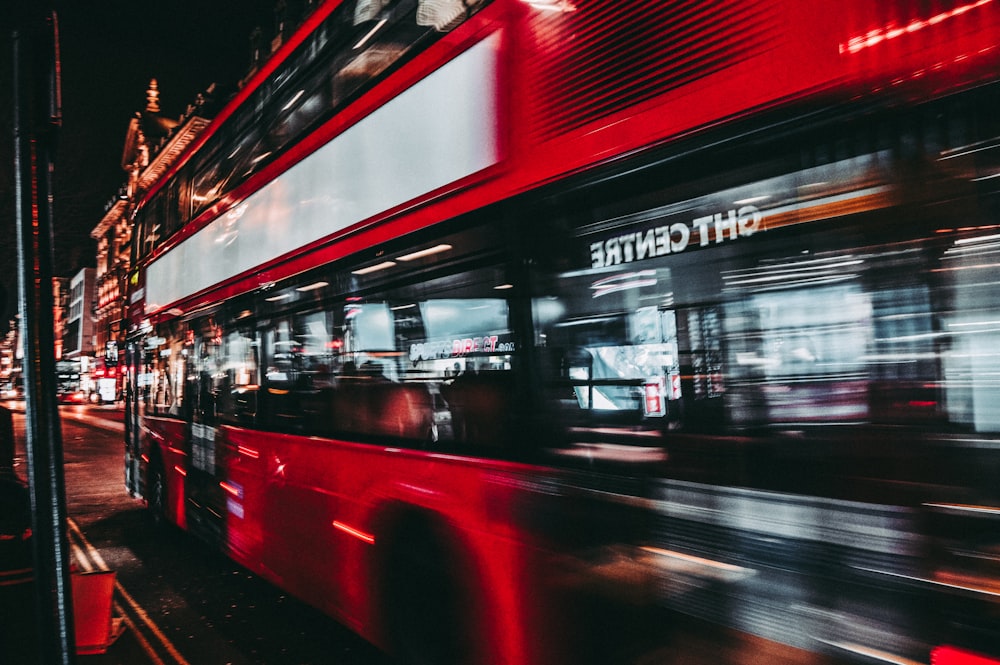 time lapse of red bus