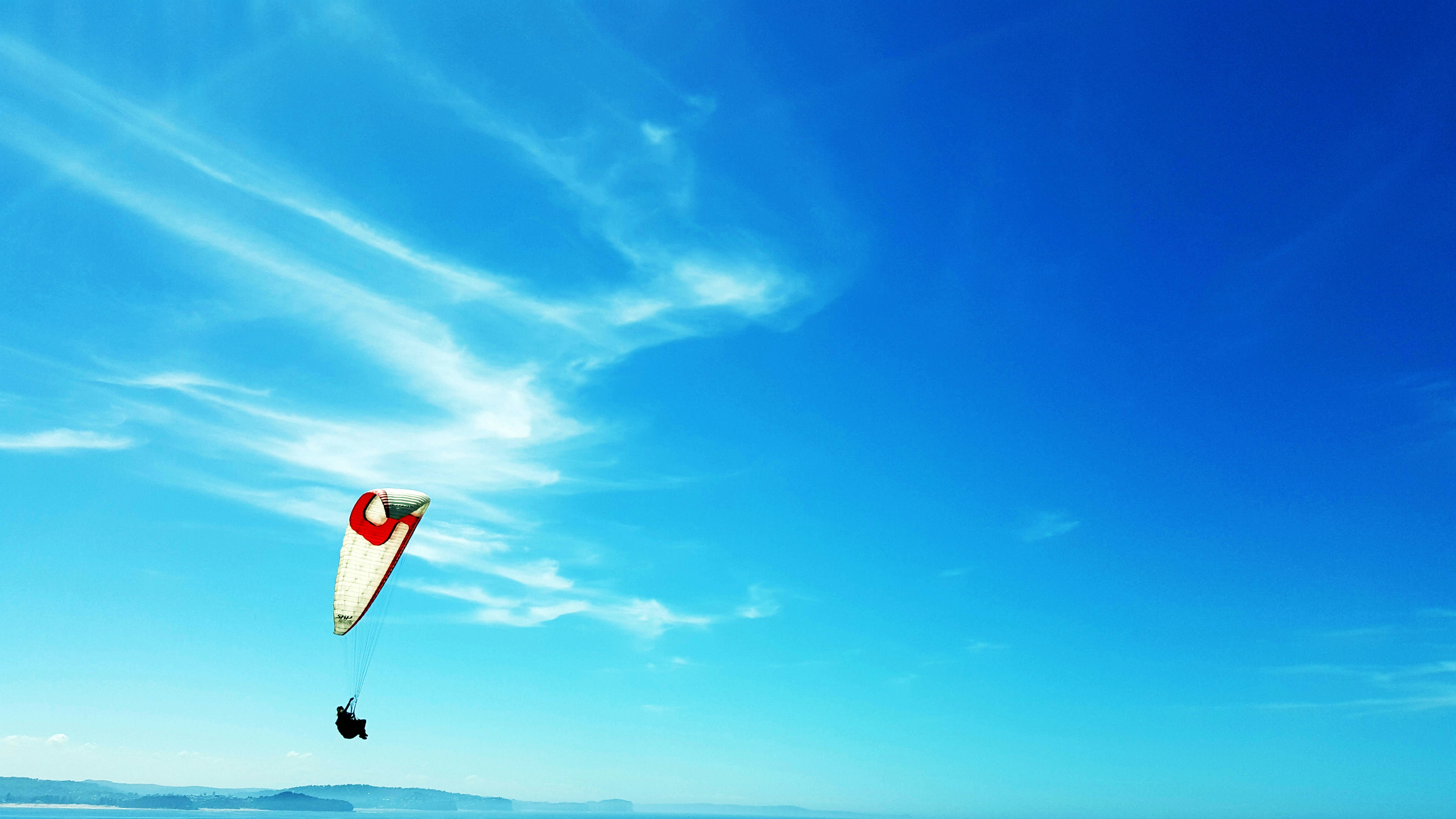 person paragliding during daytime, Paragliding