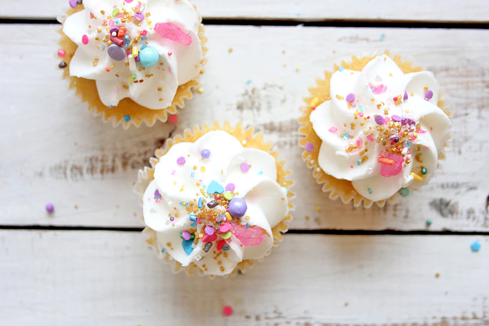 Assorted vanilla and red velvet cupcakes