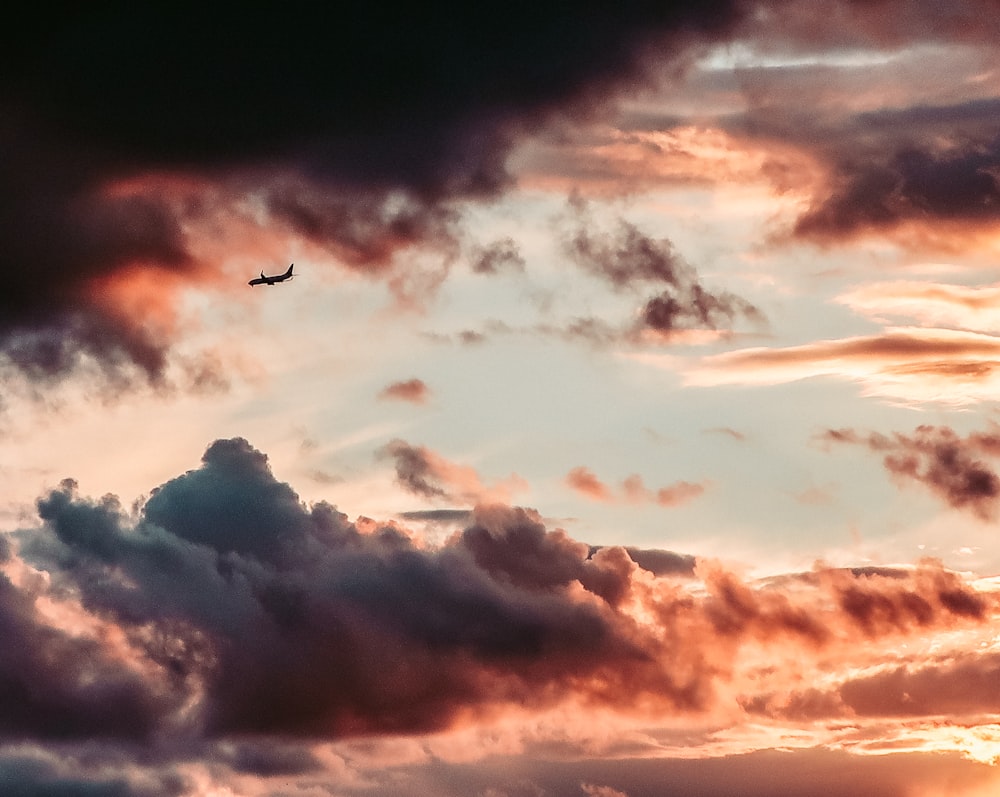 silhouette of airplane on sky