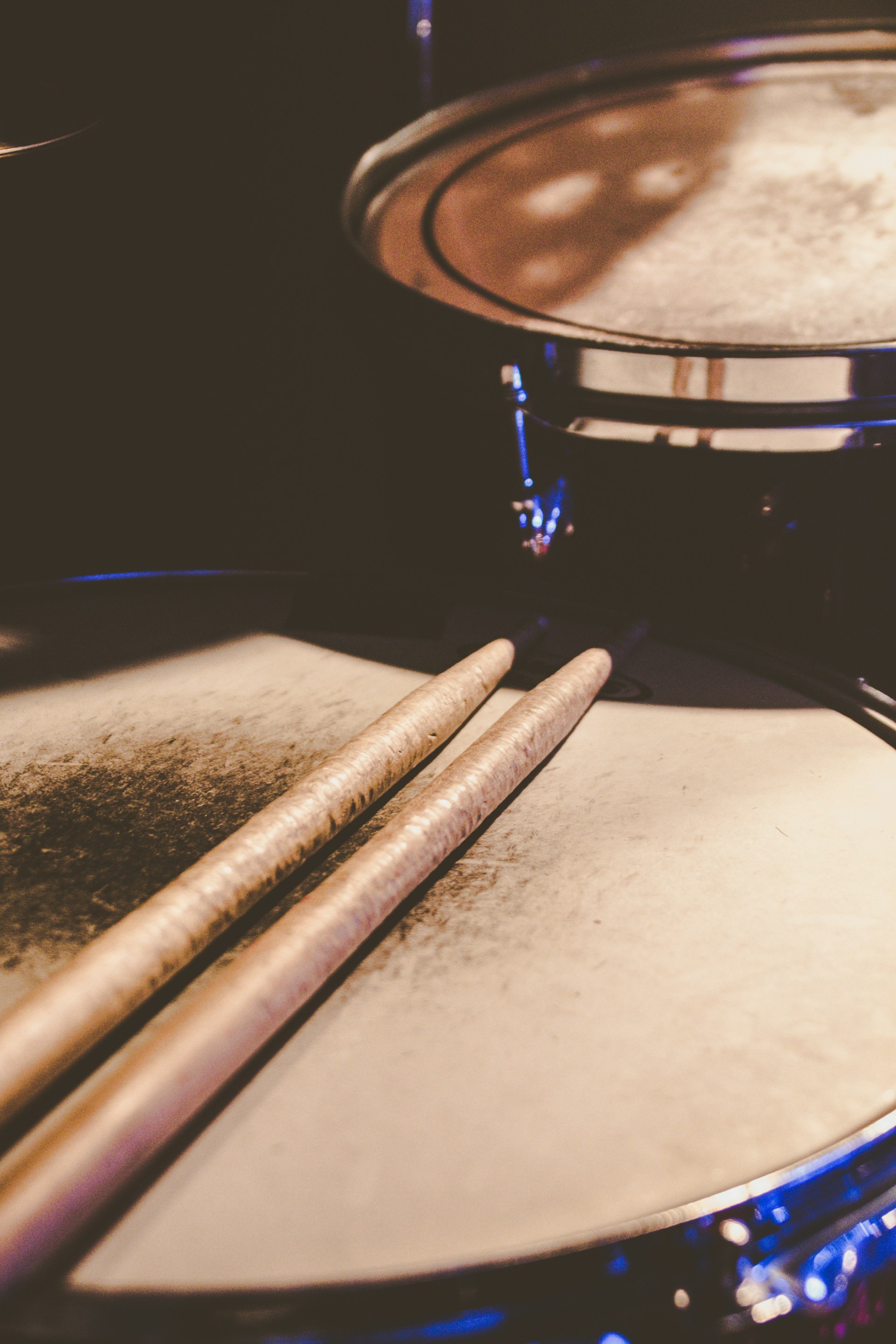 woman wearing yellow long-sleeved dress under white clouds and blue sky during daytime