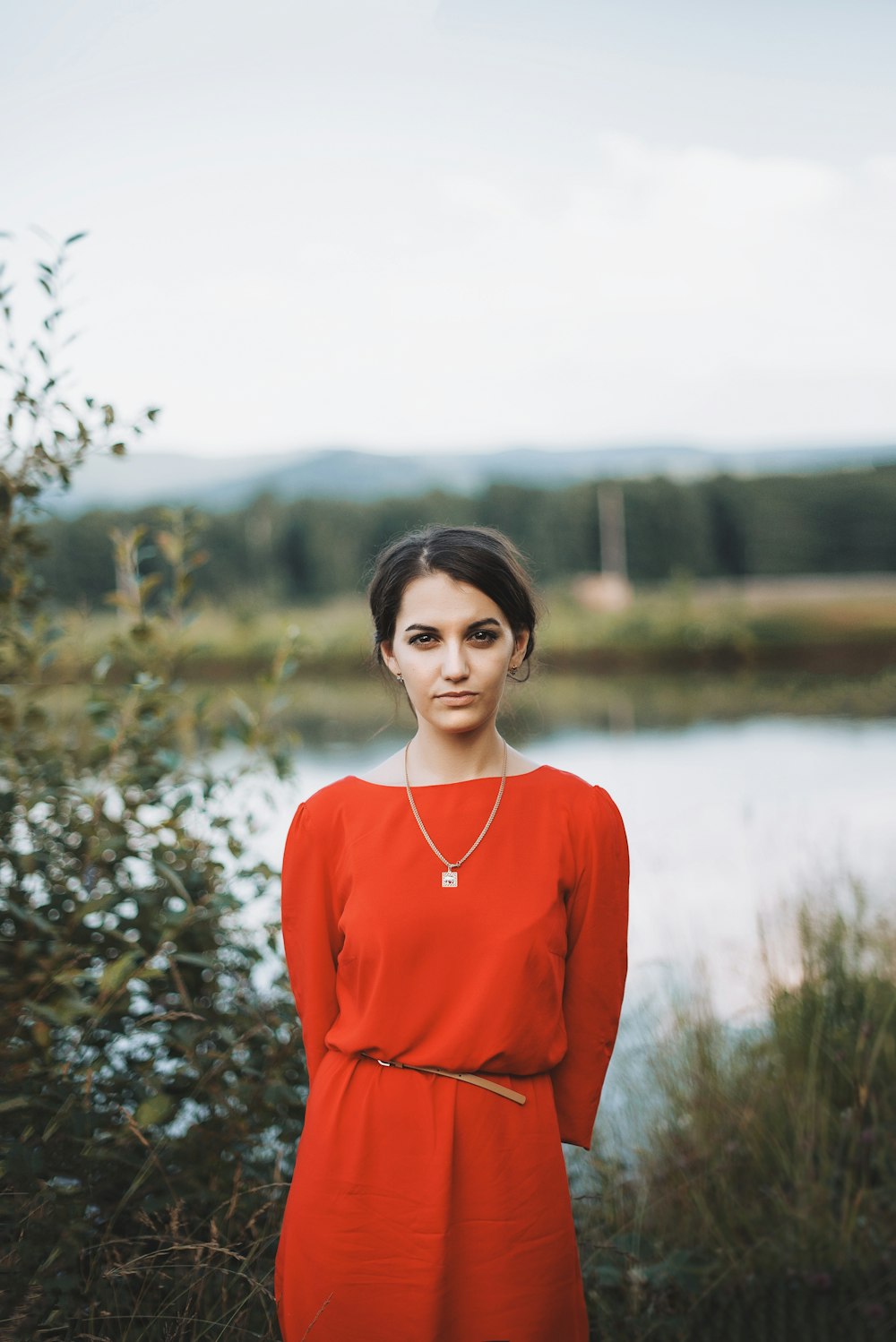 woman standing in front of body water