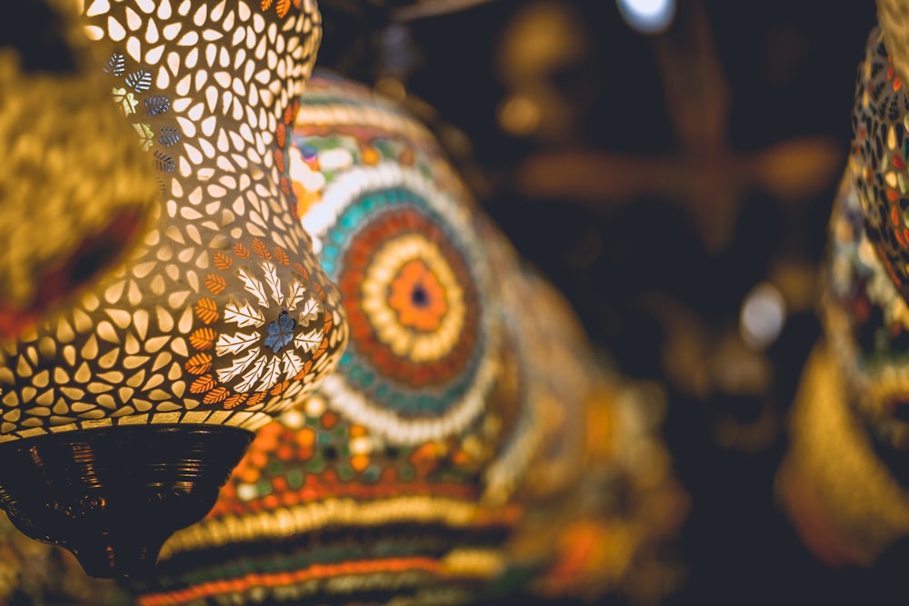 selective focus photography of white, red, and black lamp during nighttime