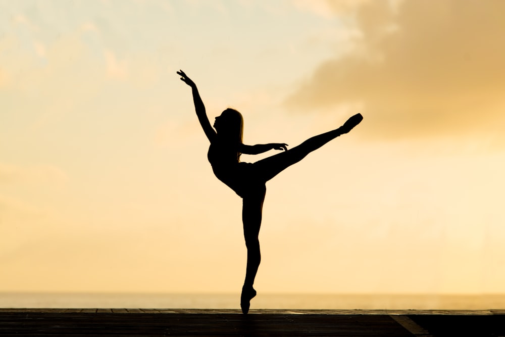 silhouette of woman dancing ballet