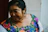 woman wearing multicolored floral dress