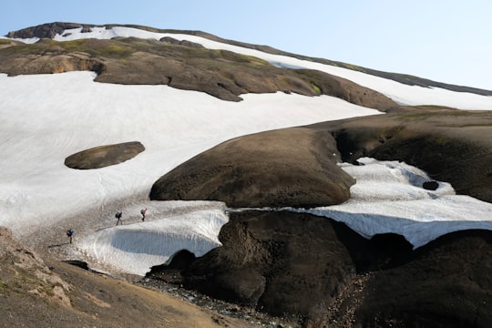 people walking in the hill in Landmannalaugar Iceland