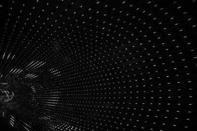 black tunnel interior with white lights abstract zoom background