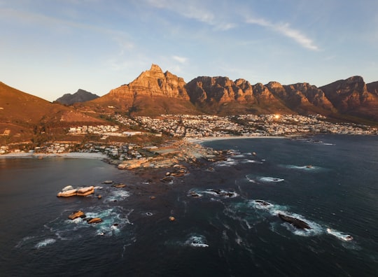 rock formations with body of water in Camps Bay South Africa