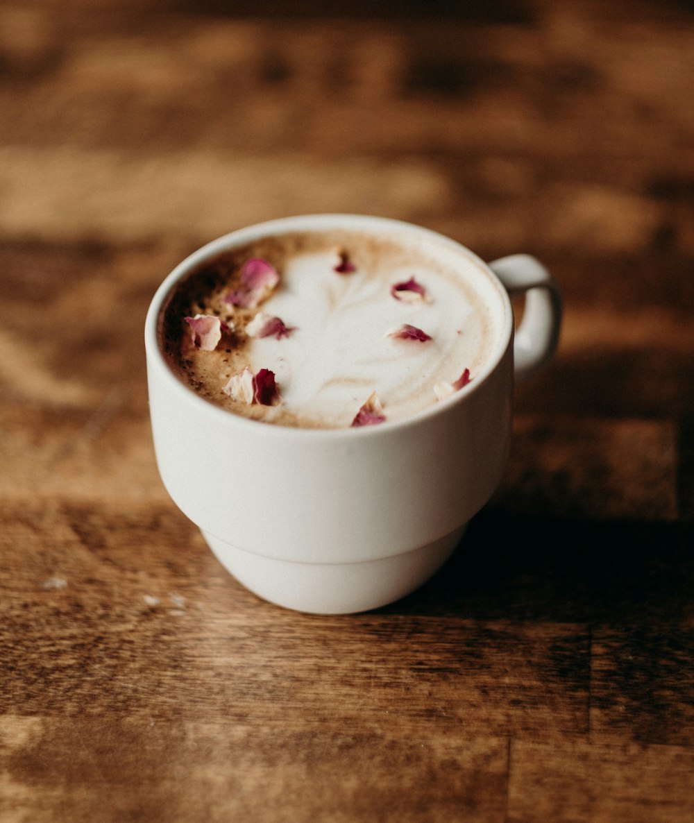 close-up photo of filled white ceramic cup