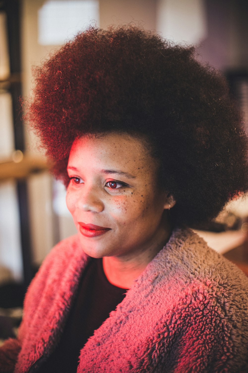 smiling woman wearing fleece coat