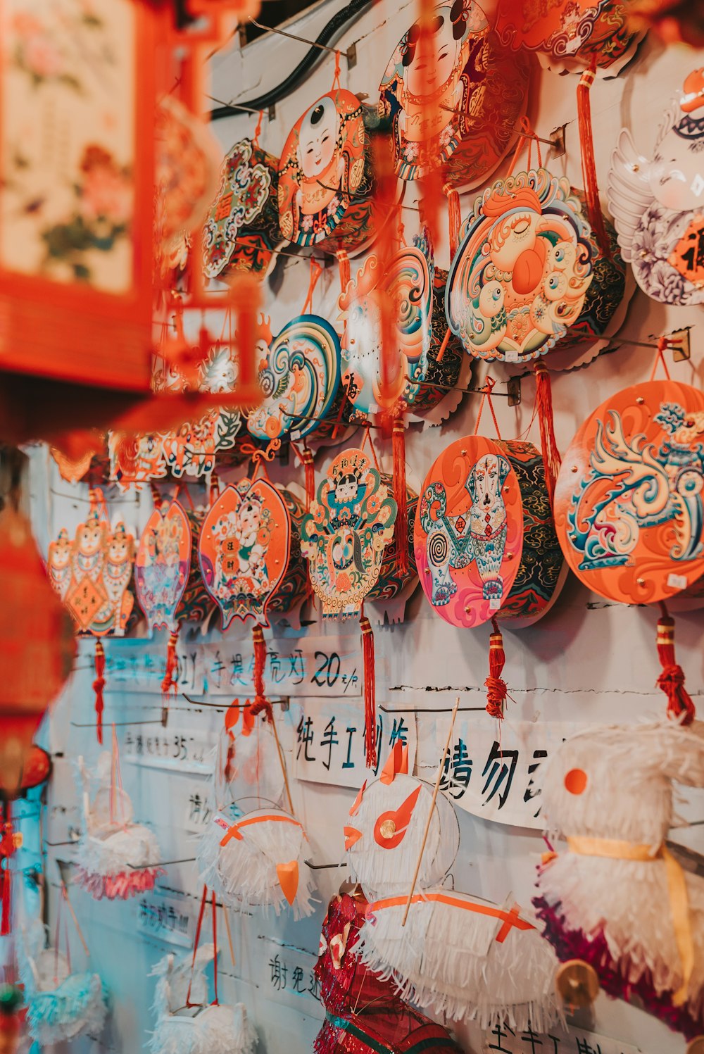 orange and teal hanging decors on wall