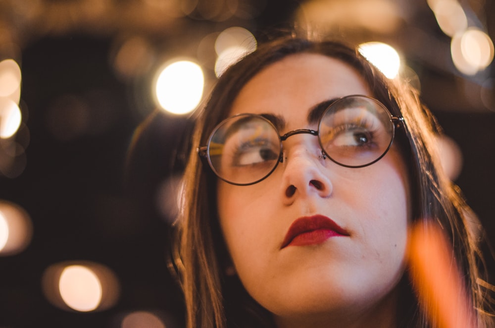 woman's face in bokeh photography