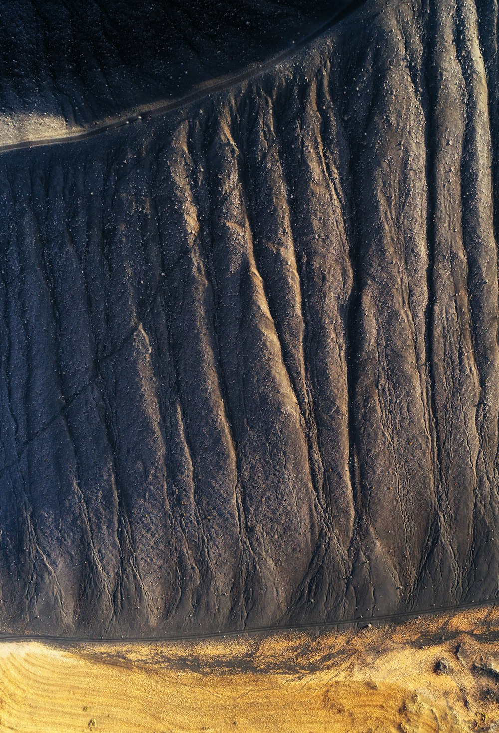 an aerial view of a large rock formation