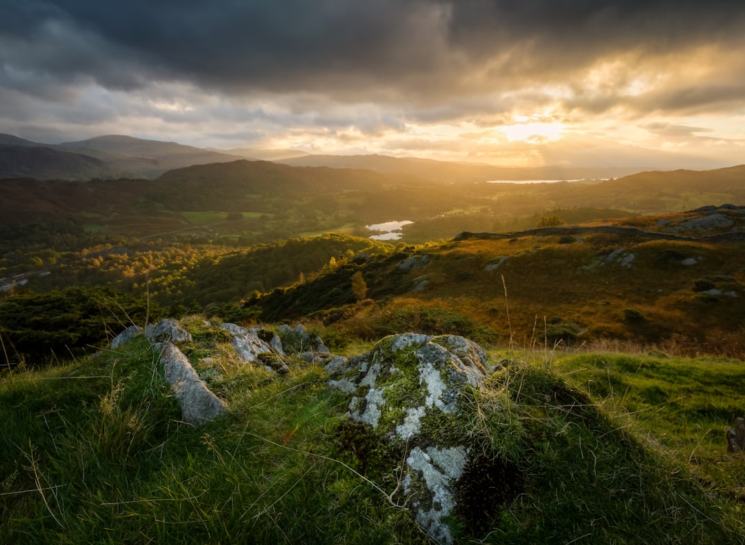 gray stone on green grass, A trek up the fell in the dark was made with it when the sun started to break through the dri