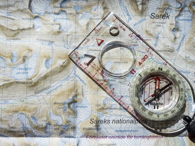 Two things which you always need when you go outdoors: Map and compass.