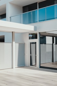 clear glass door in white frame