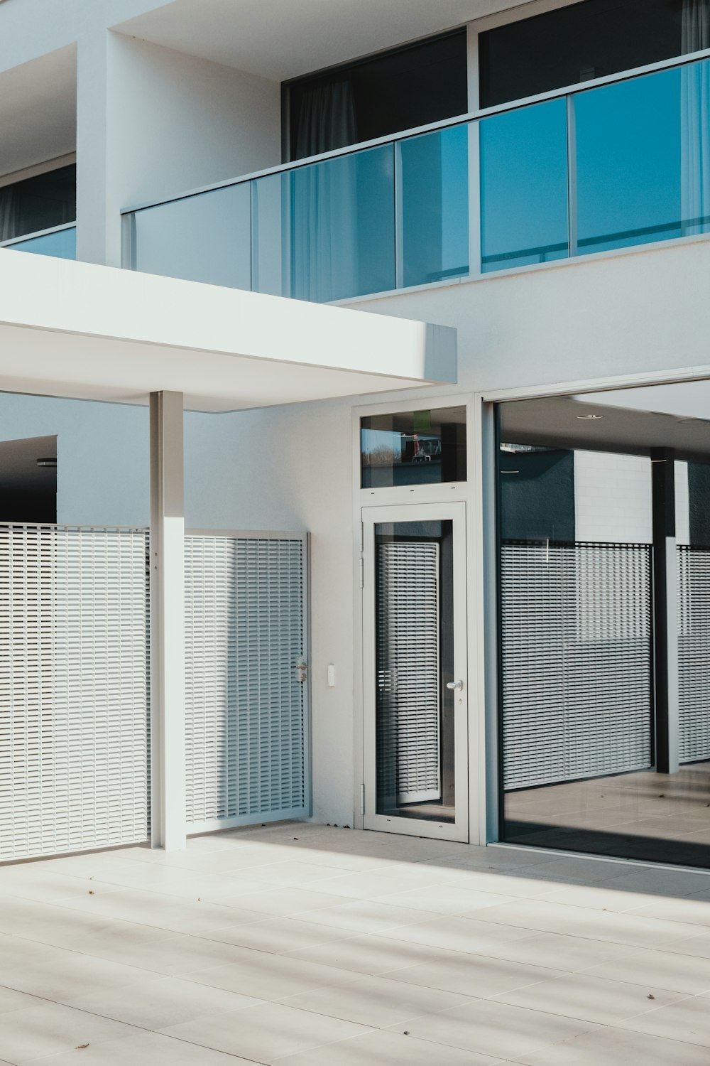 clear glass door in white frame