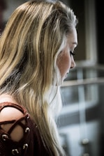 woman in brown top