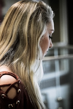 woman in brown top