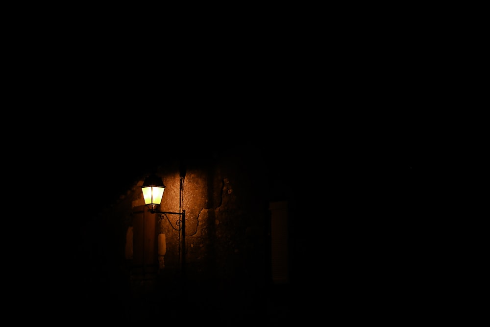 closeup photo of black patio lamp