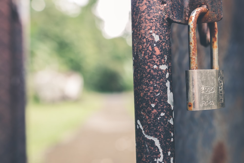 padlock on metal bar