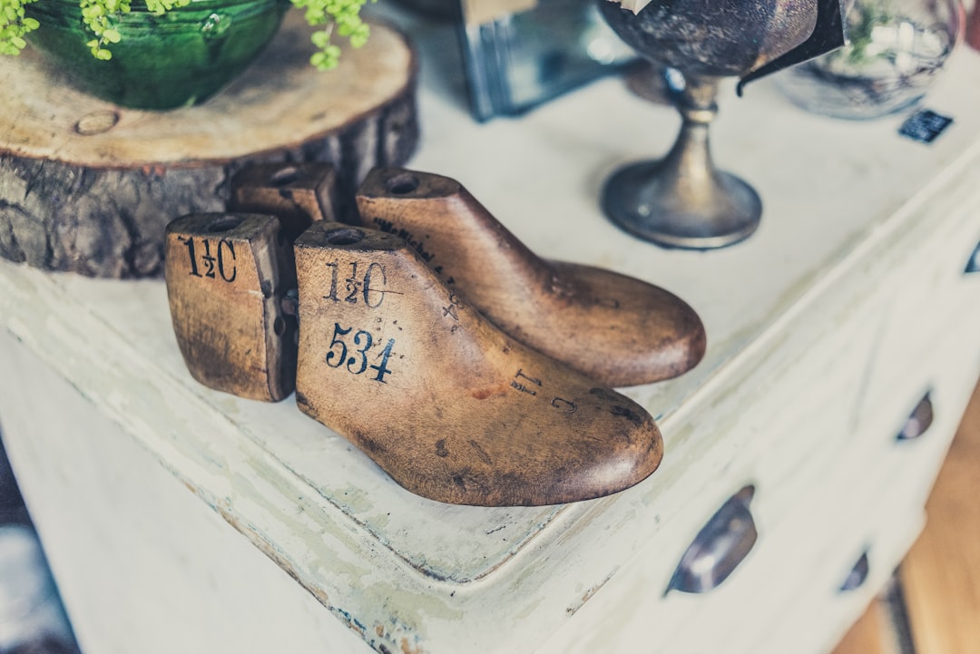 pair of brown shoe mold