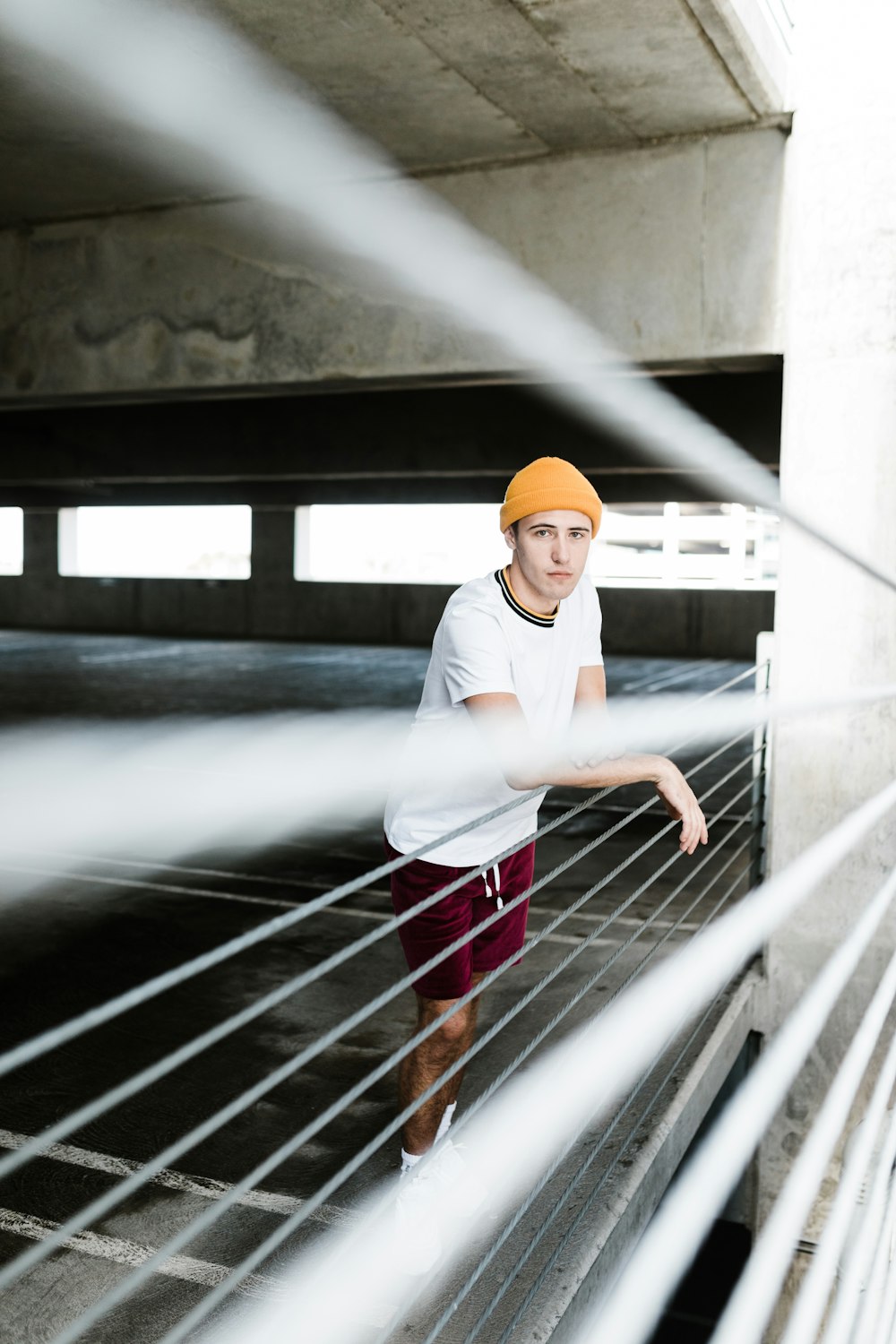 man standing at the edge of the building