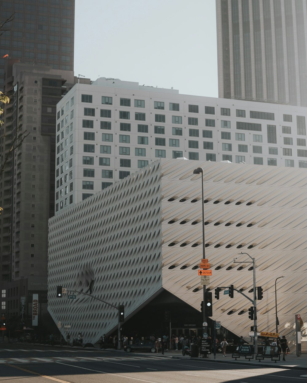 grey and white buildings near road