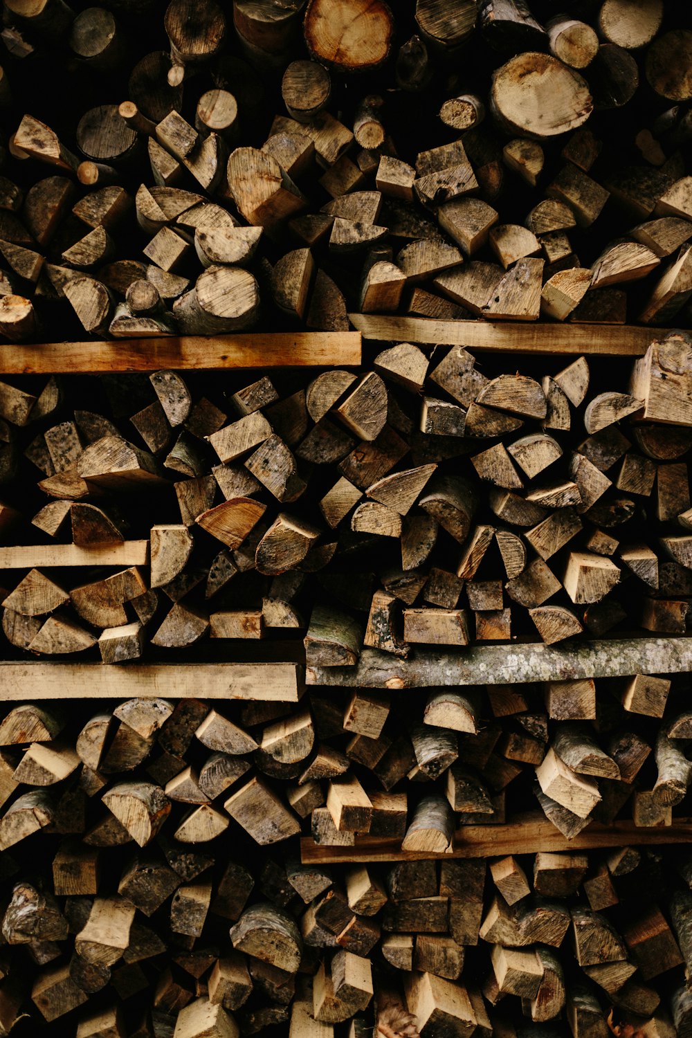 photo of brown wooden firelogs