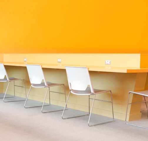 four chairs near desk