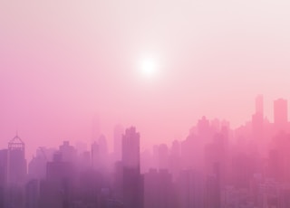 skyscraper covered with fog at daytime