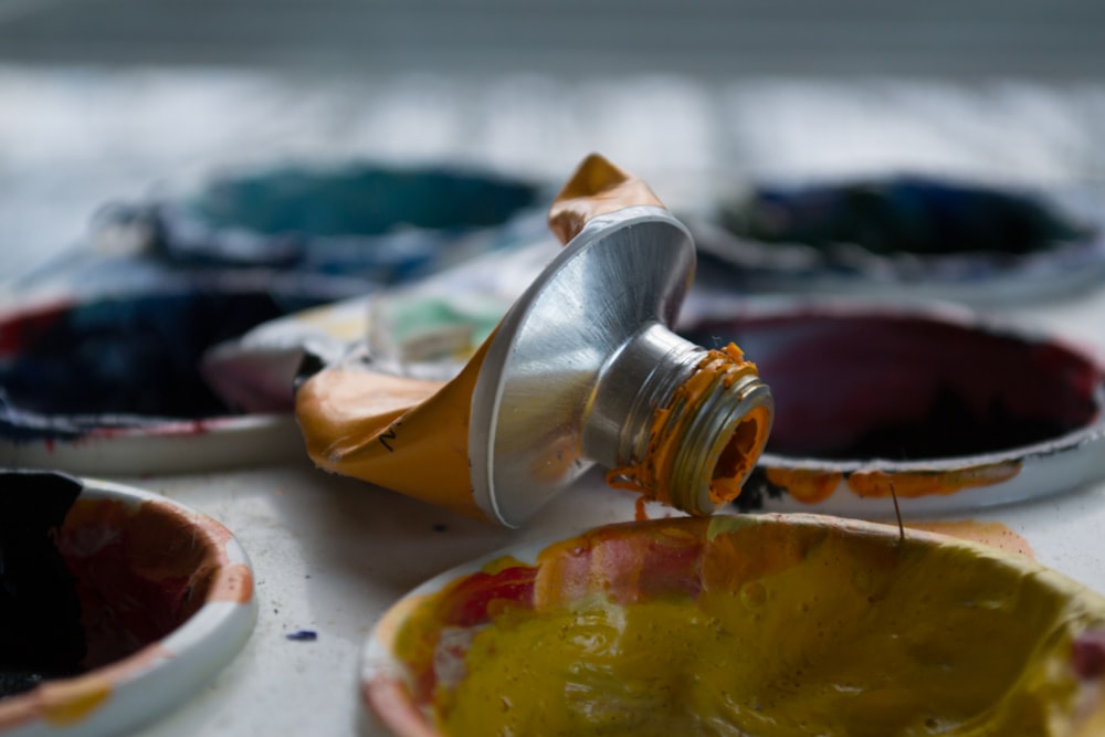 yellow liquid in clear drinking glass