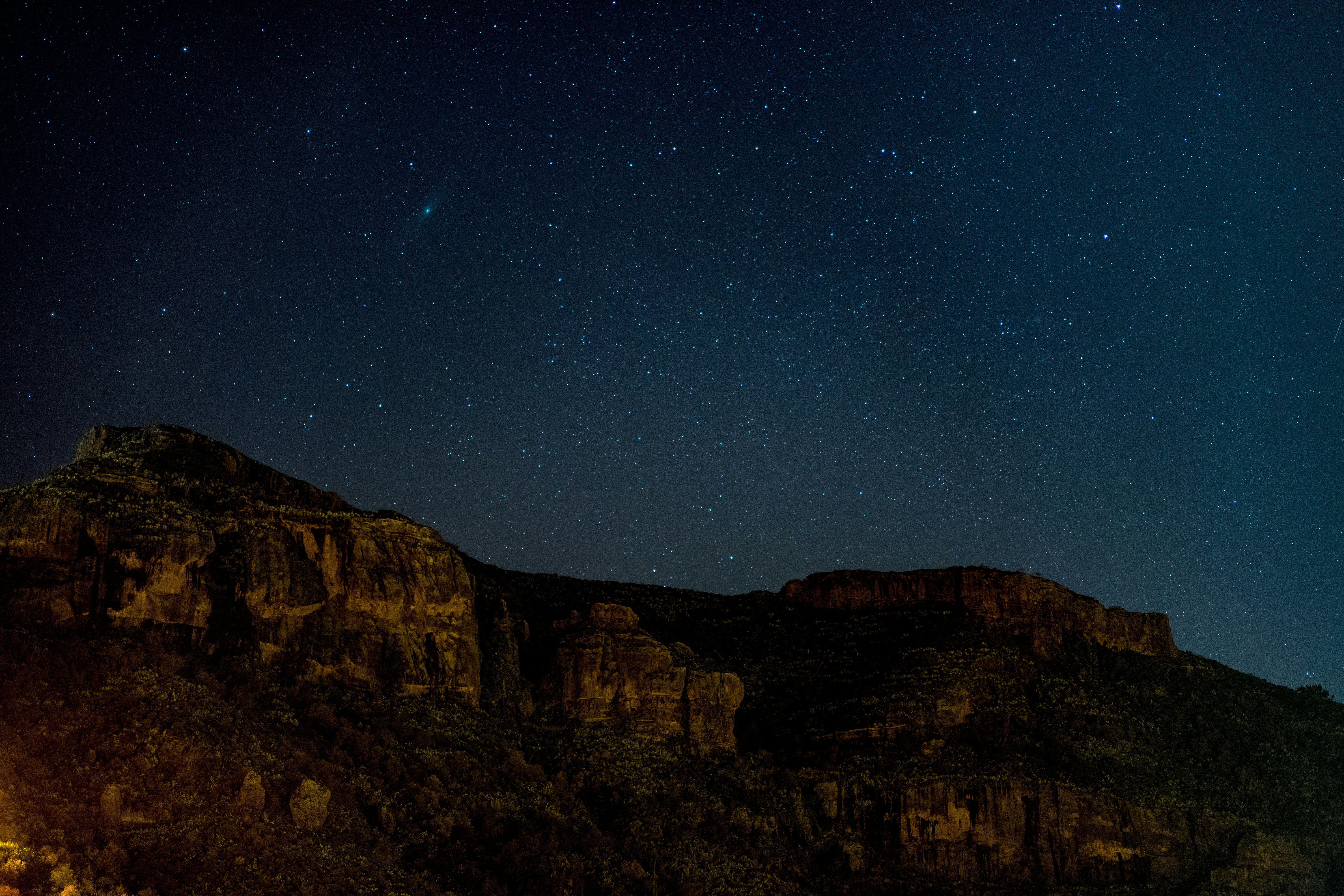 rock mountain under starry night