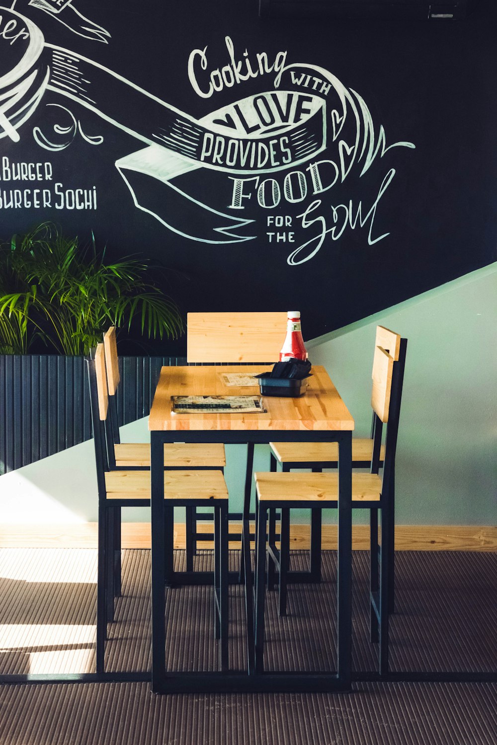 rectangular brown wooden table with chairs