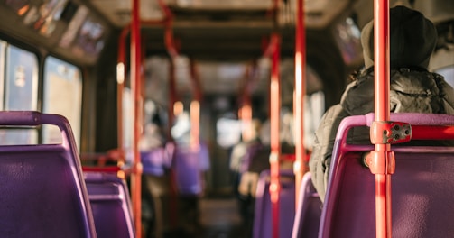 person standing in transportation vehicle