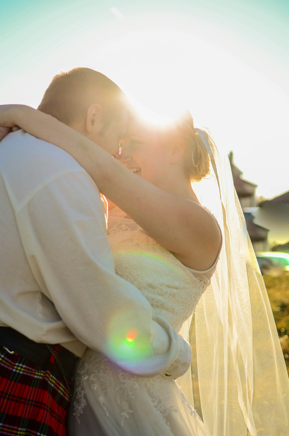 man hugging woman