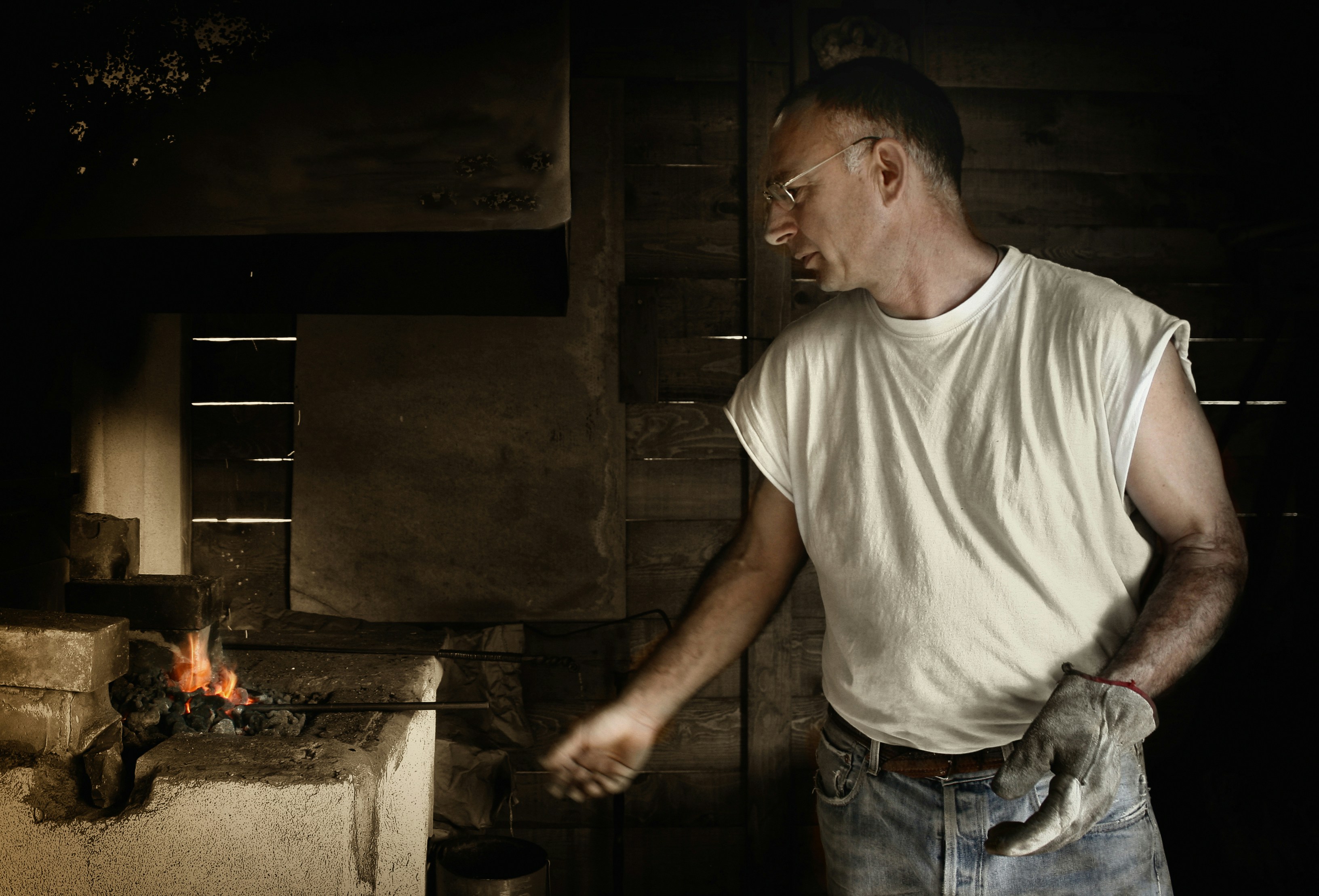 image of a technician performing annual maintenance on a furnace - emergency furnace repair