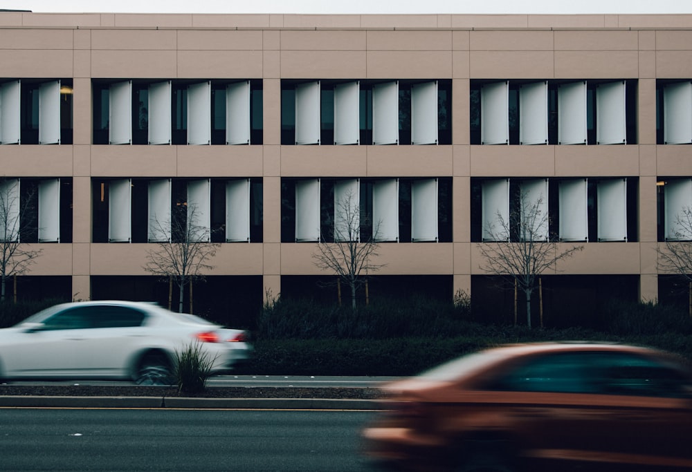 time lapse photography of white and gold cars