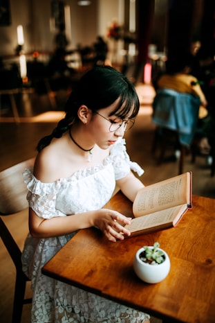 woman reading mystery fiction