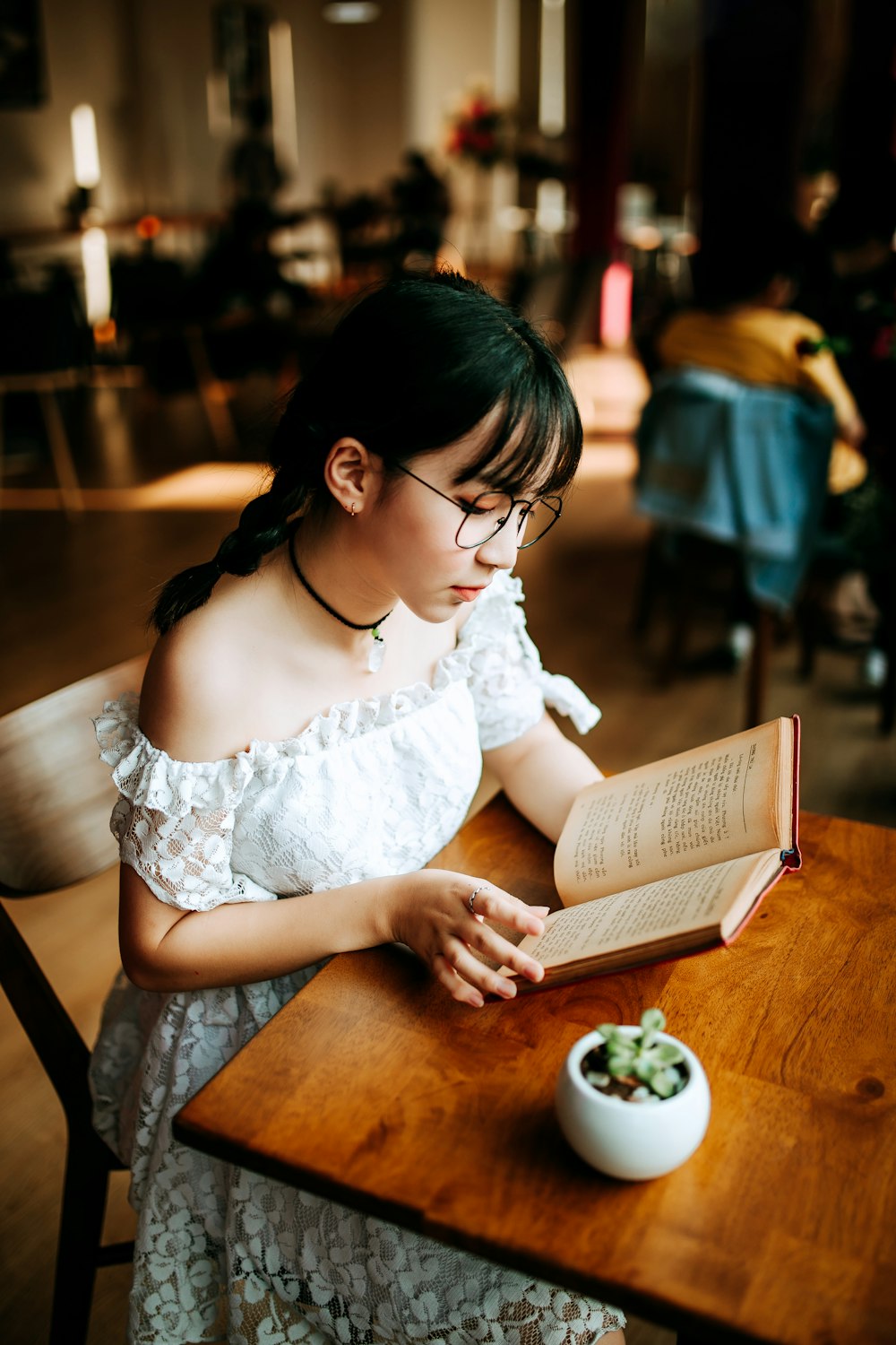 woman reading books