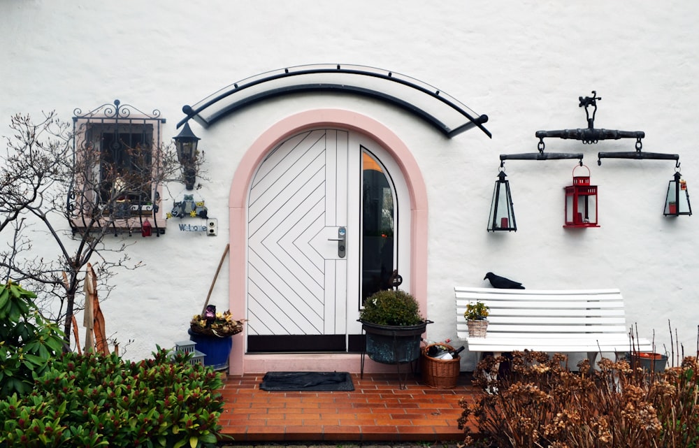 white wooden door beside bench