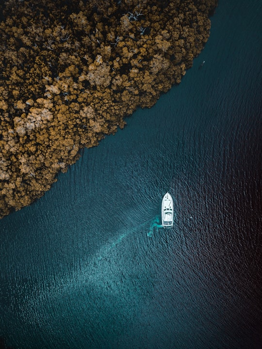 bird's-eye view of boat on body of water in Marco Island United States