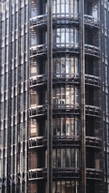 A bustling commercial building with expansive glass facades and sturdy aluminium accents.