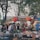 A vibrant market scene showcasing local products and people.