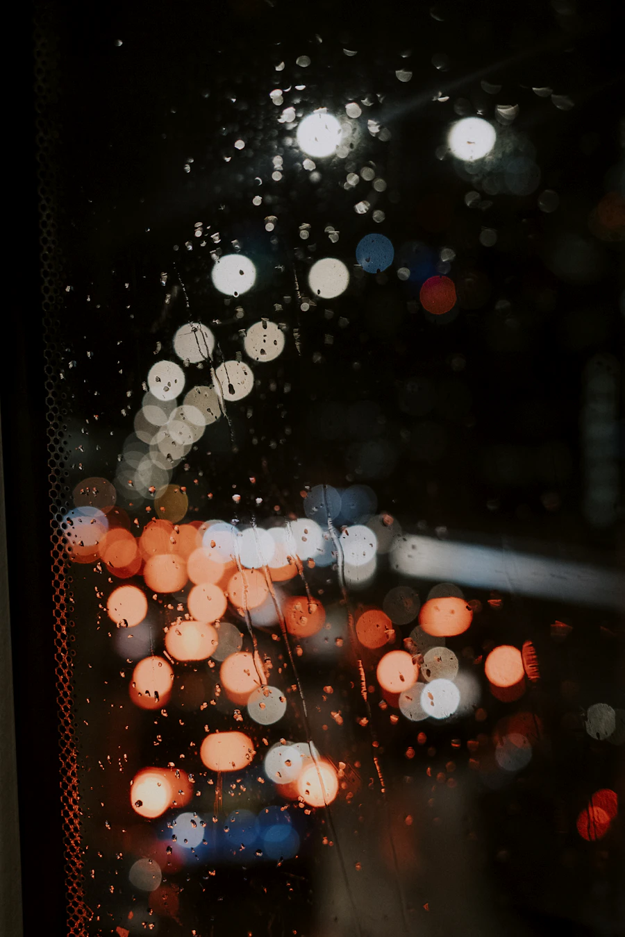 Out-of-focus city lights in warm and white circles