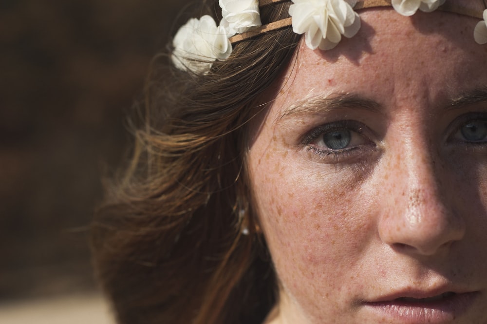 portrait photo of woman wearing floral crown