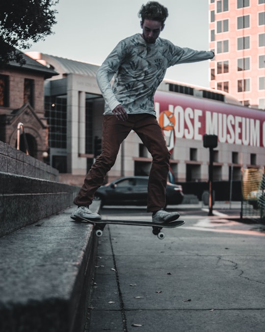 man playing skateboard on staircase in San Jose United States