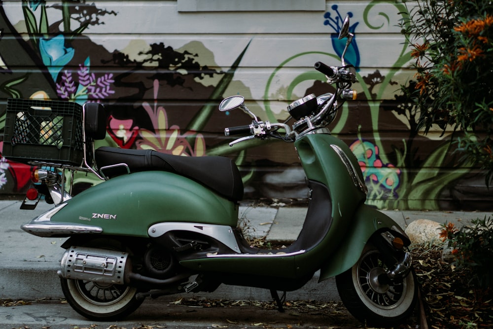 green and black motor scooter